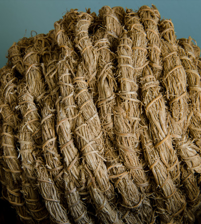 Twine and wicker is wrapped up tightly into a decorative ballの写真素材