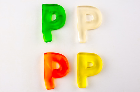 A set of four gummy letters in the shape of P isolated on whiteの写真素材