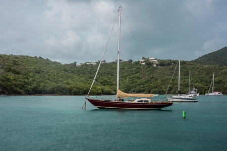 Sailboats idle during a rainstorm in Maho Bay in St John