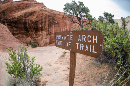 A fisheye view of the Private Arch and sign noting end of trailの写真素材