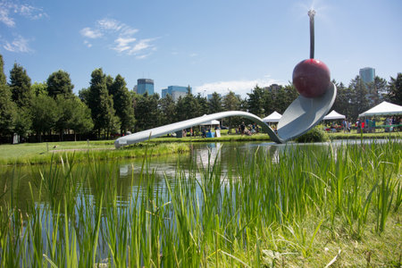 Minneapolis, United States: August 1, 2015: An iconic statue of a spoon and cherry at an art museum in Minneapolis, Minnesotaのeditorial素材
