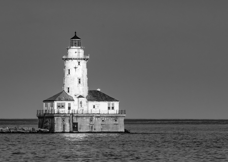 Chicago Harbor Light on Lake Michigan in Black and Whiteの写真素材