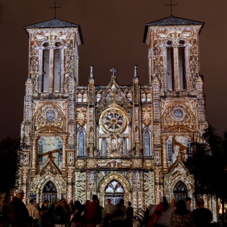 January 21, 2017: San Antonio, Texas: San Fernando Cathedral Lights up with an Ornate public art light show with crowd watchingのeditorial素材