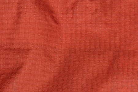 Orange Rain Coat Fabric captured with a macro lens