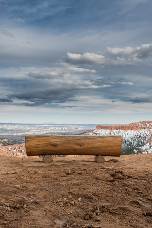 Log Bench Overlooking Bryce in early springの写真素材