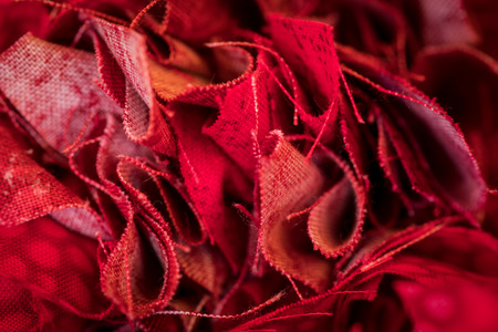 Bunched Edges of Red Fabric in close up shotの写真素材