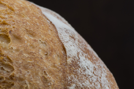 Close Up of Flour on French Roll with copy space to rightの写真素材