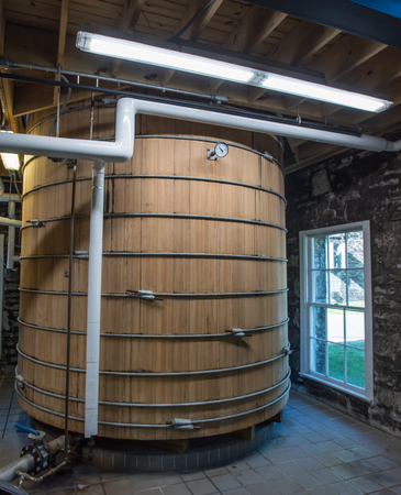 Lower View of Bourbon Mash Tank in distillery