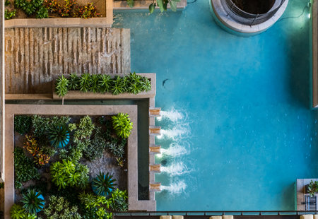 San Antonio, United States: January 22, 2017: Conceptual editorial of business space with Looking Down on Large Fountain with small interior gardenのeditorial素材