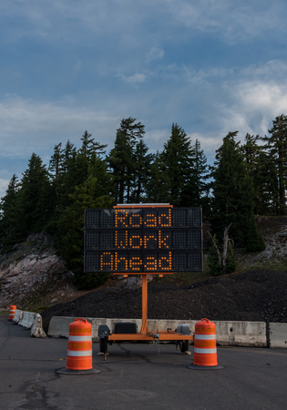Road Work Ahead Construction Sign Vertical indicates warning of delaysの写真素材