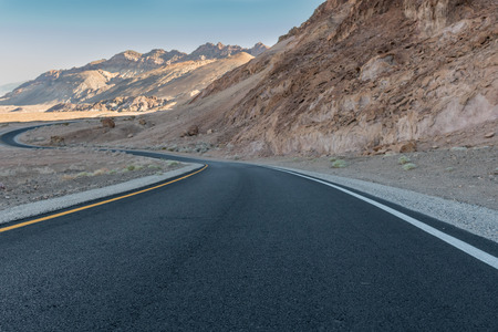 Winding Road Through Bare Mountains in Death Valley wildernessの写真素材