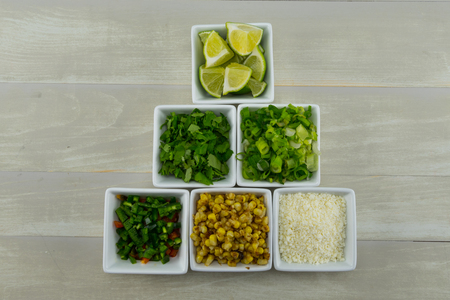 Fresh Toppings for Mexican Food in bowlsの写真素材