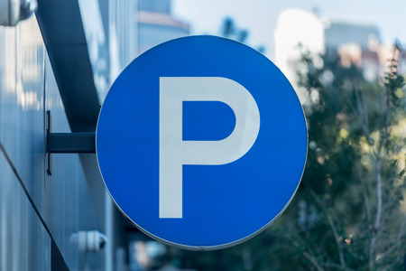 Large P Parking Sign along city parking deckの写真素材