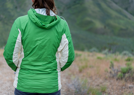 Torso of Woman Wearing Rain Coat with Copy Spaceの写真素材