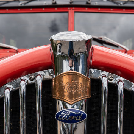 June 29, 2018: Many Glacier, United States: Red Jammer Grill on a vintage car used for touring...