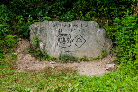 A large rock is etched with the details of an Appalachian Trail road crossing in Georgiaの写真素材