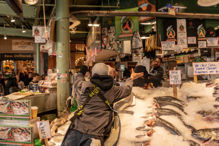 October 4, 2018: Seattle, United States: FIsh Throwing at Pikes Place Marketのeditorial素材