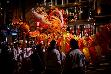 San Francisco, United States: Febraury 23, 2019: Orange and Yellow Chinese Dragons at end of annual Chinese New year paradeのeditorial素材