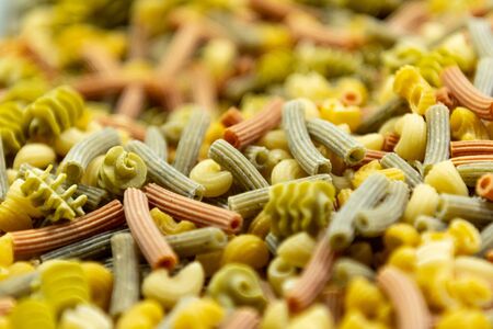 Fresh Pasta Shallow Focus of multiple shapes and colors of noodles