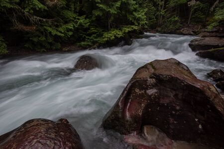 Snow Melt Rushing Through Creek In Glacier in Montana