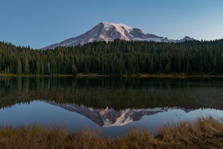 Mt. Rainier Reflects in Mirror Lake in early morningの写真素材