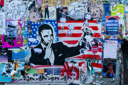 Seattle, United States: October 4, 2018L Obama Mic Drop Graffiti along plastered wall