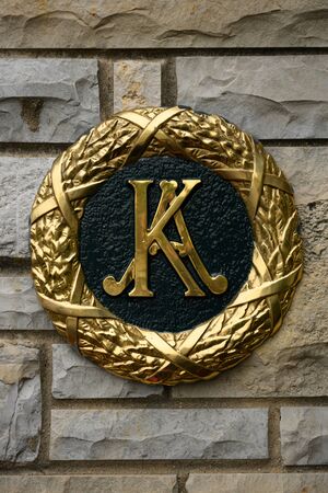 Lexington, United States: May 3, 2019: Keeneland Crest on Stone Wall at an iconic sports complex