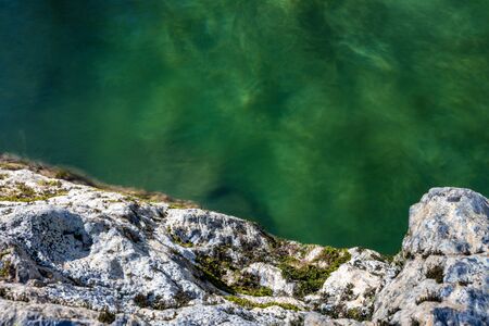 Looking down on green water in the Smokies in the winterの写真素材