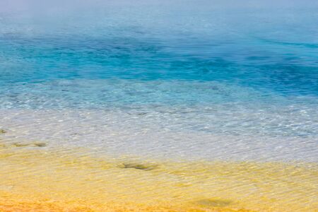 Yellow Fades to Blue in Hot Spring in Yellowstone