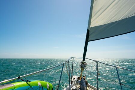 Unfurling Sail Across Biscayne Bay along Florida coastの写真素材