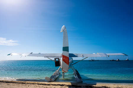 Sea Plane Parked at Beach in Caribbean