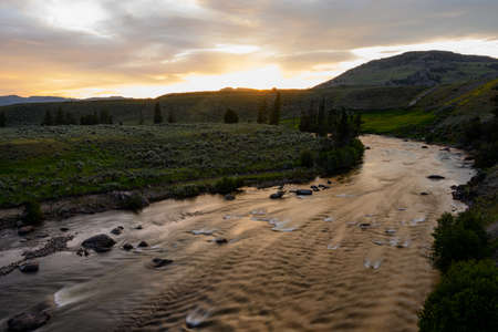 Sunlight Fades Over Yellowstone River heading into Lamar valleyの写真素材