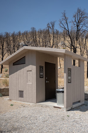 Handicapped Pit Toilet alongside gravel road in Great Basin National Parkの写真素材