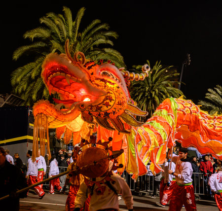 San Francisco, United States: Febraury 23, 2019: Orange Chinese Dragon Head and Palm Treesのeditorial素材