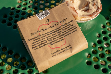 Fuita, United States: August 10, 2020: The Pioneer Spirit of Fruit next to cinnamon roll
