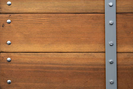 Wood Wtih Metal Bolts Backgroundの写真素材