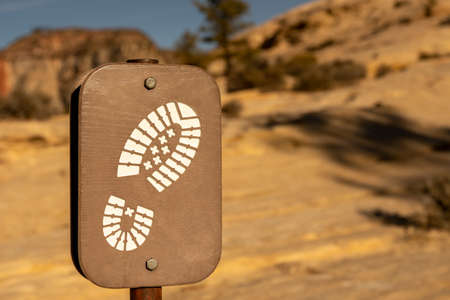 Footprint Sign Leads Hikers Along the West Rim Trail in Zion National Parkの写真素材