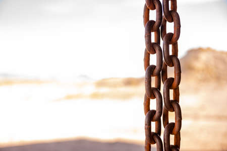 Rain Chain And Blown Out Background With Copy Space to leftの写真素材