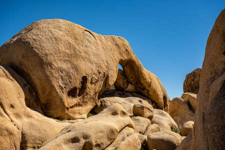 Looking Up At An Empty Arch Rock in Joshua Tree National Parkの写真素材