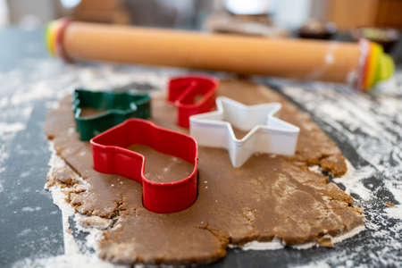 Low Angle View of Stocking Cookie Cutter in Gingerbread Dough