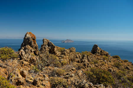 Jagged Rocks of Santa Cruz Island With Anacapa Island In the Distance in Channel Islands National Parkの写真素材