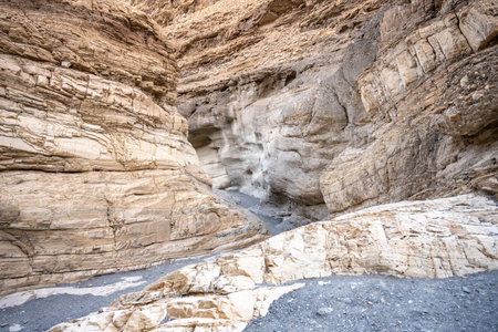Trail Winding Through The White Walls Of Mosaic Canyon in Death Valleyの写真素材