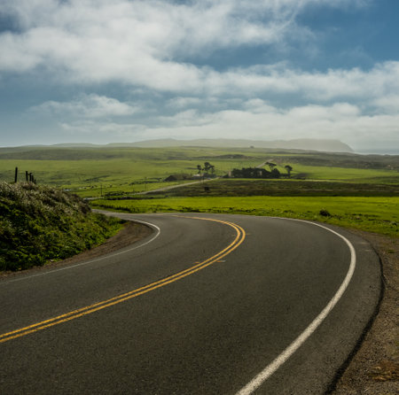 Curving Road Heading to Point Reyes Lighthouse in Californiaの写真素材