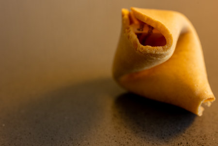 Crispy Edge of Fortune Cookie With Copy Space to leftの写真素材