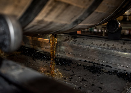 Bourbon Pouring Out of Barrel in a Kentucky distilleryの写真素材