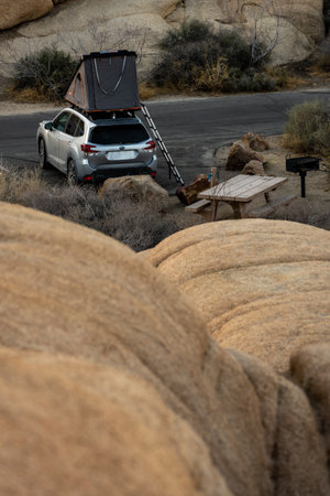 Joshua Tree National Park, United States: March 1, 2021: Subaru With Roof Top Tent In Jumbo Rocks Campground showcases an increasingly popular way of getting outside and enjoying natureのeditorial素材