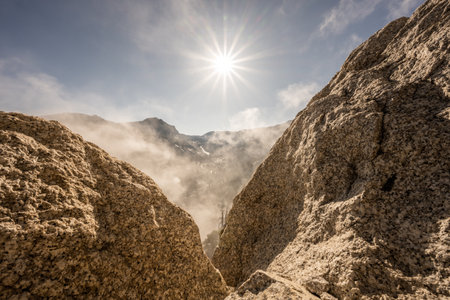 Sunburst Over V Between Rocks in Sequoia  National Parkの写真素材