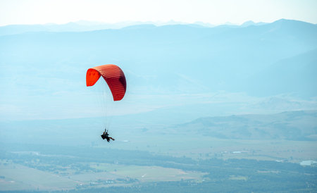 Paraglider Flying Over Jackson Holeの写真素材