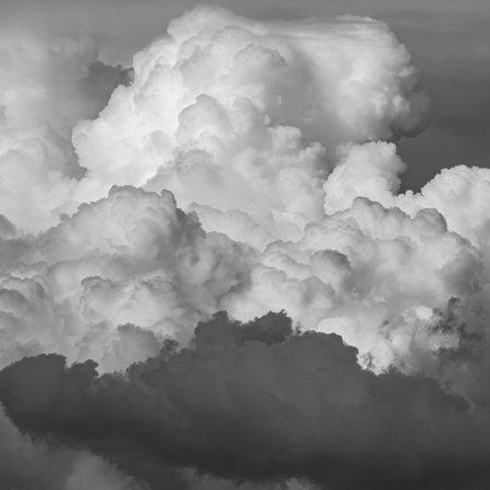 Billowing Clouds Create Layers Above Crater Lake Natiional Park in black and whiteの写真素材