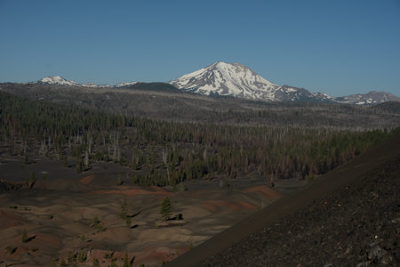 Fantatic Lava Beds Transition to Burned Forest Beneath Lassen Peak in Summerの写真素材